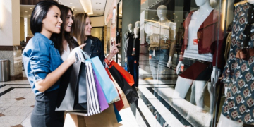 girls exploring shop window with excitement 23 2147669984