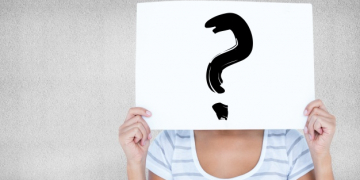 woman with sign face with question mark 1134 555