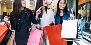 pretty girls exploring shops mall 23 2147669973