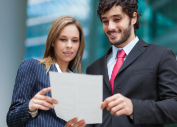 business people reading document 53419 7991