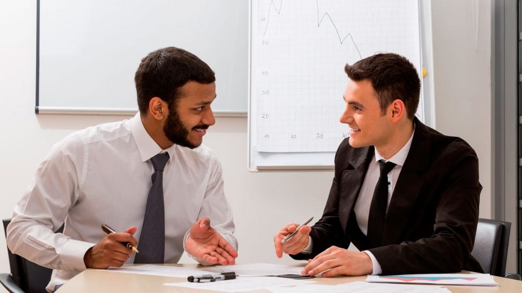 Un business coaching dando asesoría