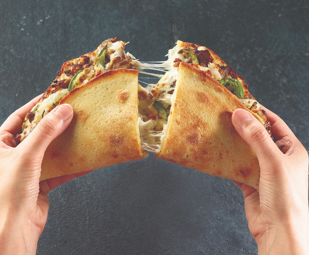 “Papadias” mitad pizza, mitad sándwich 2 Papadias mitad pizza, mitad sándiwch