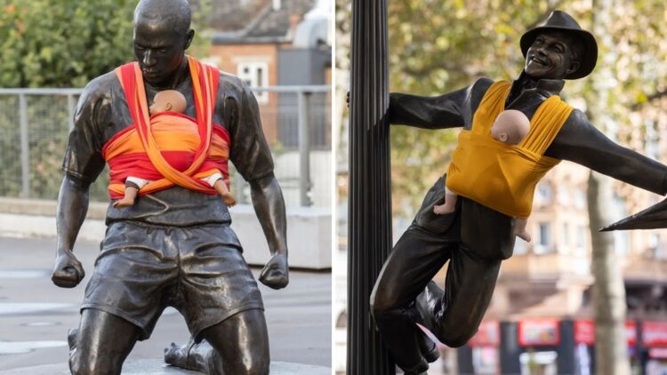 Estatuas amanecen con portabebés para exigir mejoras en la licencia por paternidad 1 Estatuas portabebés licencia por paternidad